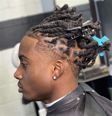 taper fade with dreads|dreads with fade styling.